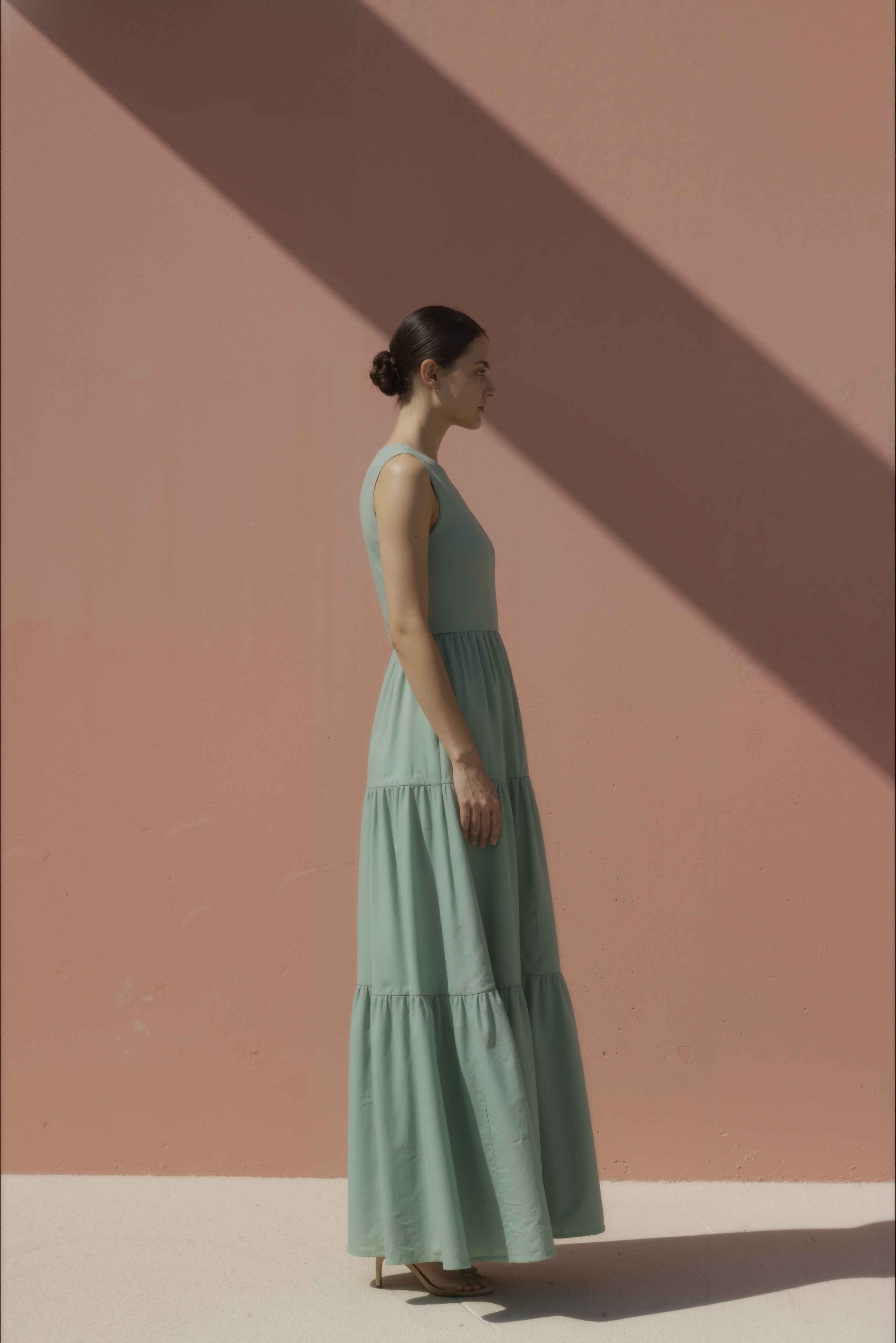 Women in Sage Green High-Neck Tiered Cotton Maxi Dress